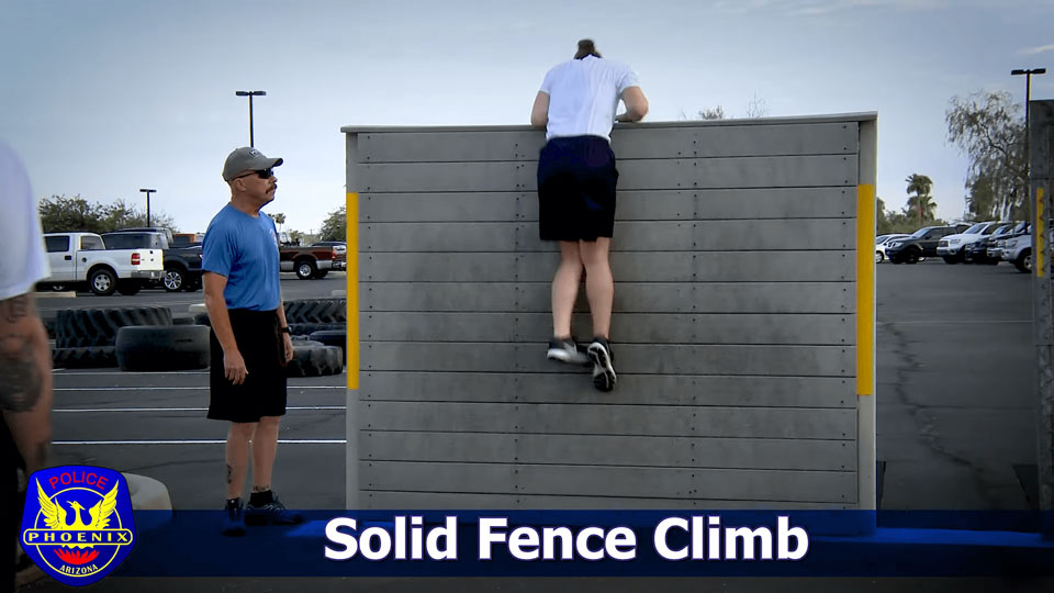 POPAT is a challenging physical test that assesses an individual's ability to perform a solid fence climb. During the test, participants must demonstrate their proficiency in scaling a solid fence.